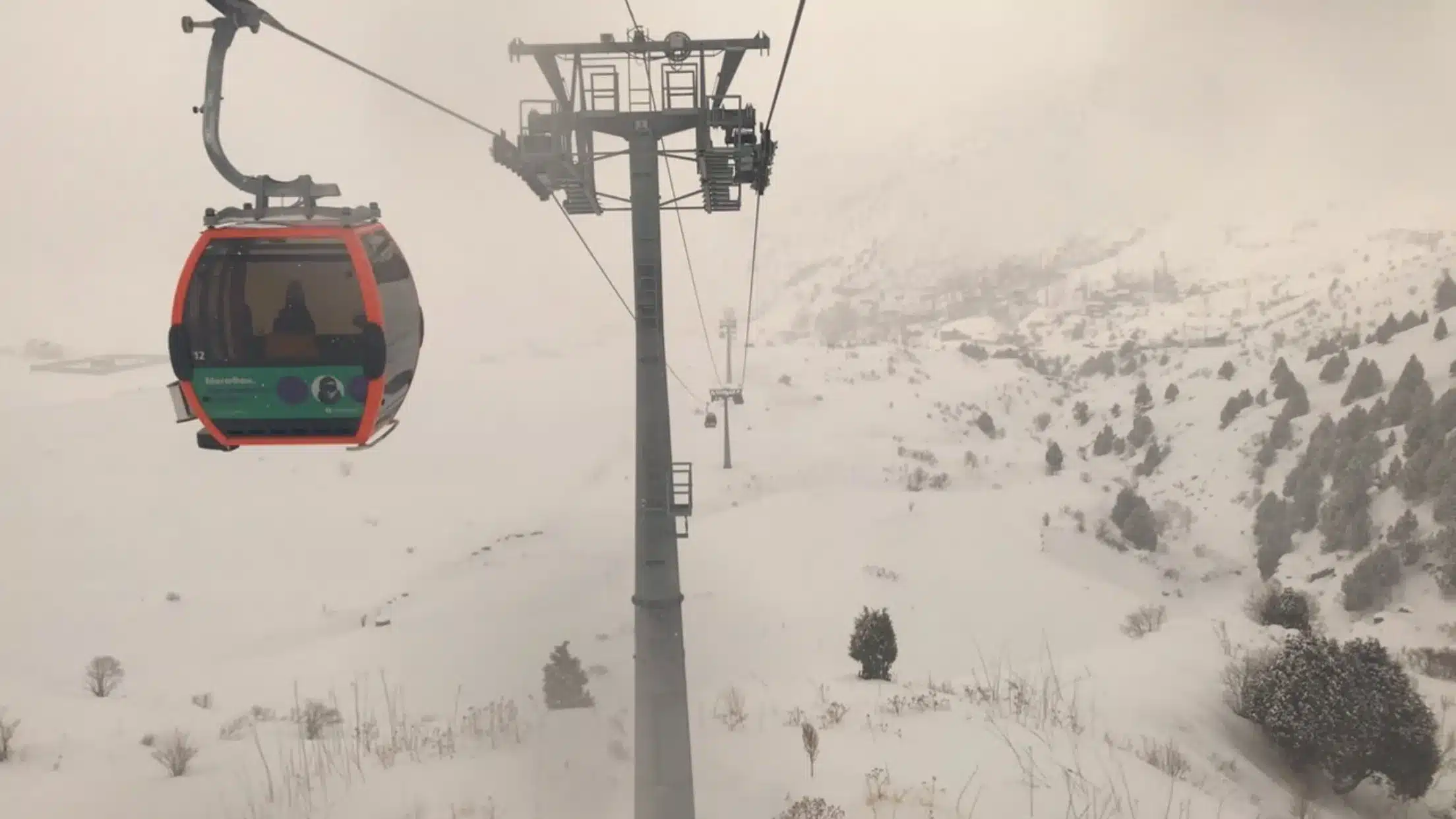 Cable car ride at Safed-Dara Resort offering panoramic mountain views